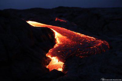 The flowing lava in Kalapana at night