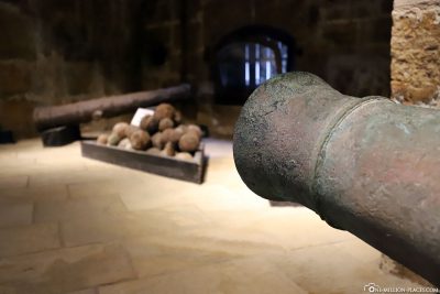 Old cannon with bullets in the fortress