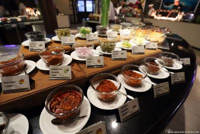 Various sauces and spices at the buffet